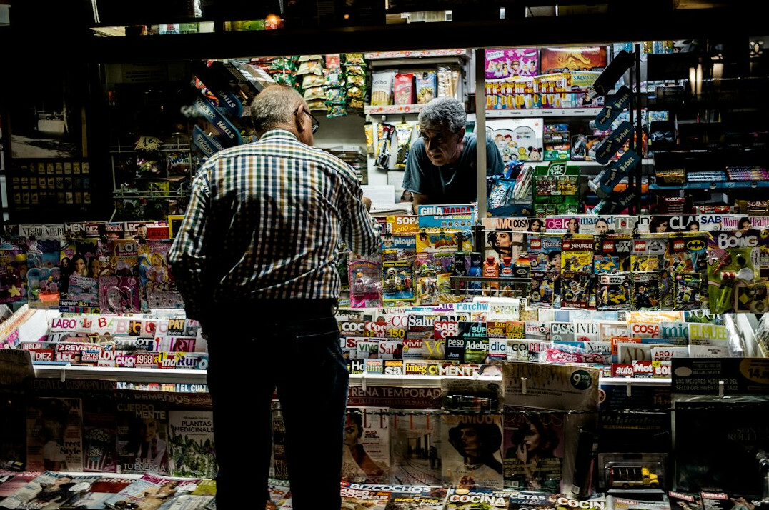 store detective observing shoppers