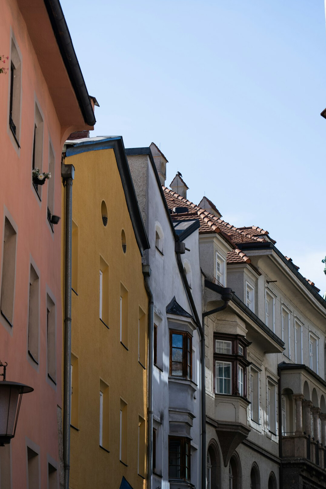 Historic European old town street with colorful tenement houses