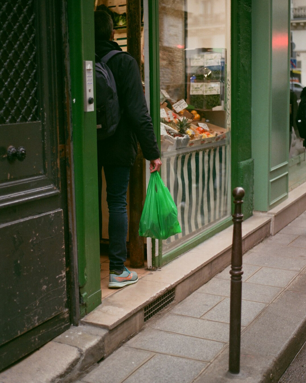 thief hiding items in bag